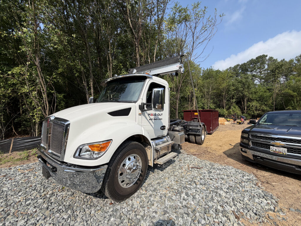 Haul-Out Maryland roll-off dumpster truck used for local dumpster delivery and pickup